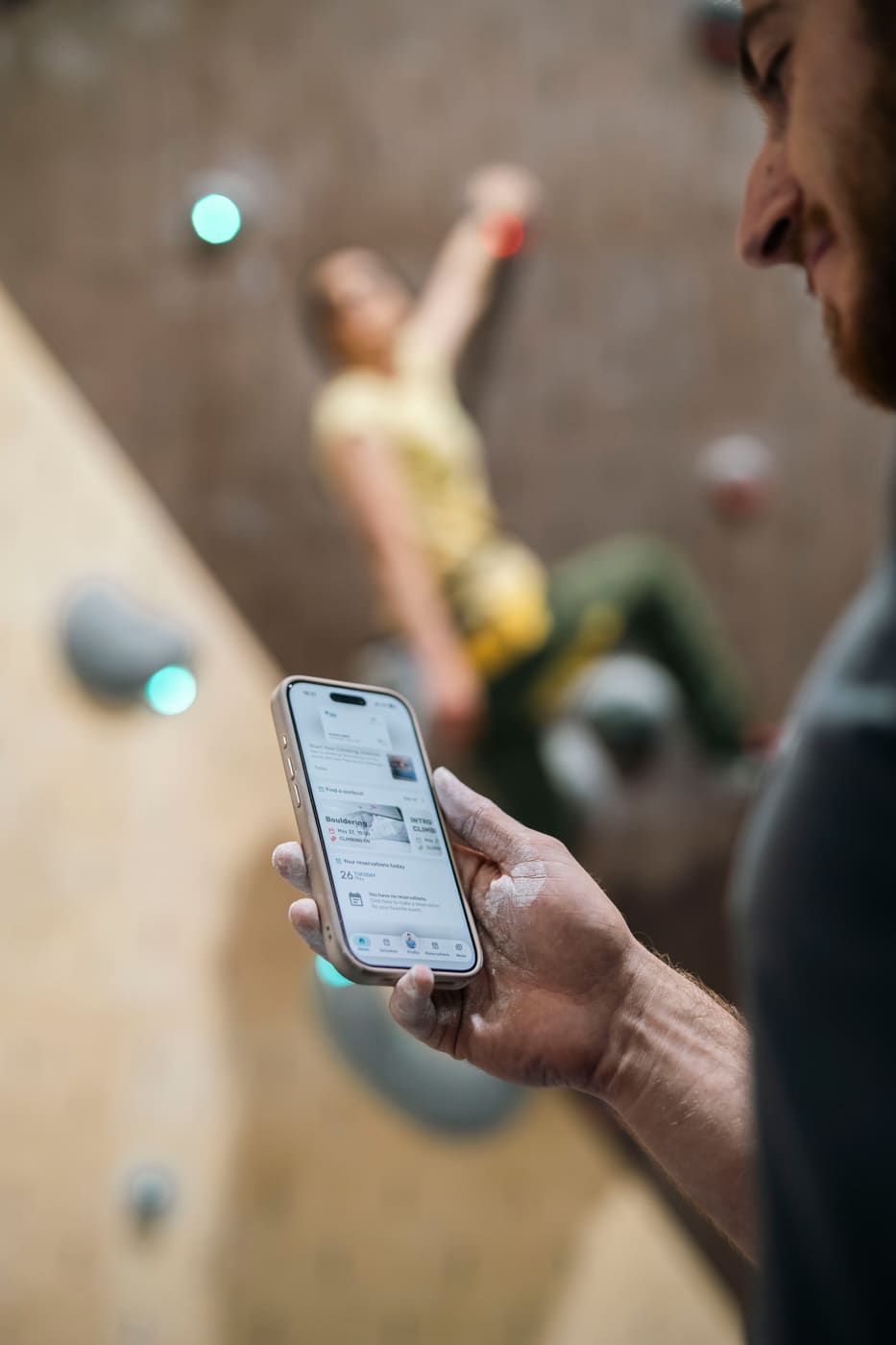 Member using the GymRealm branded gym mobile app